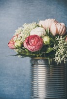 Flowers in tin can