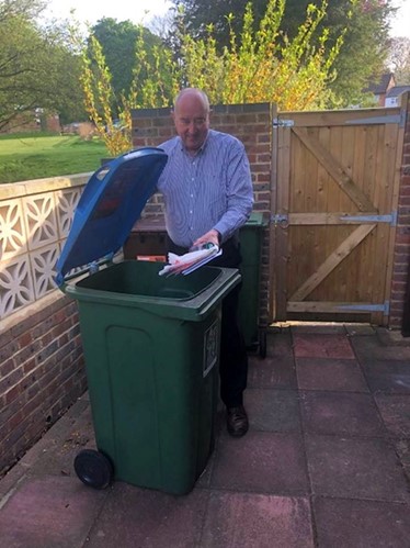 Peter Strachan, Cabinet Member for Climate Change and Environment, recycling at his home.